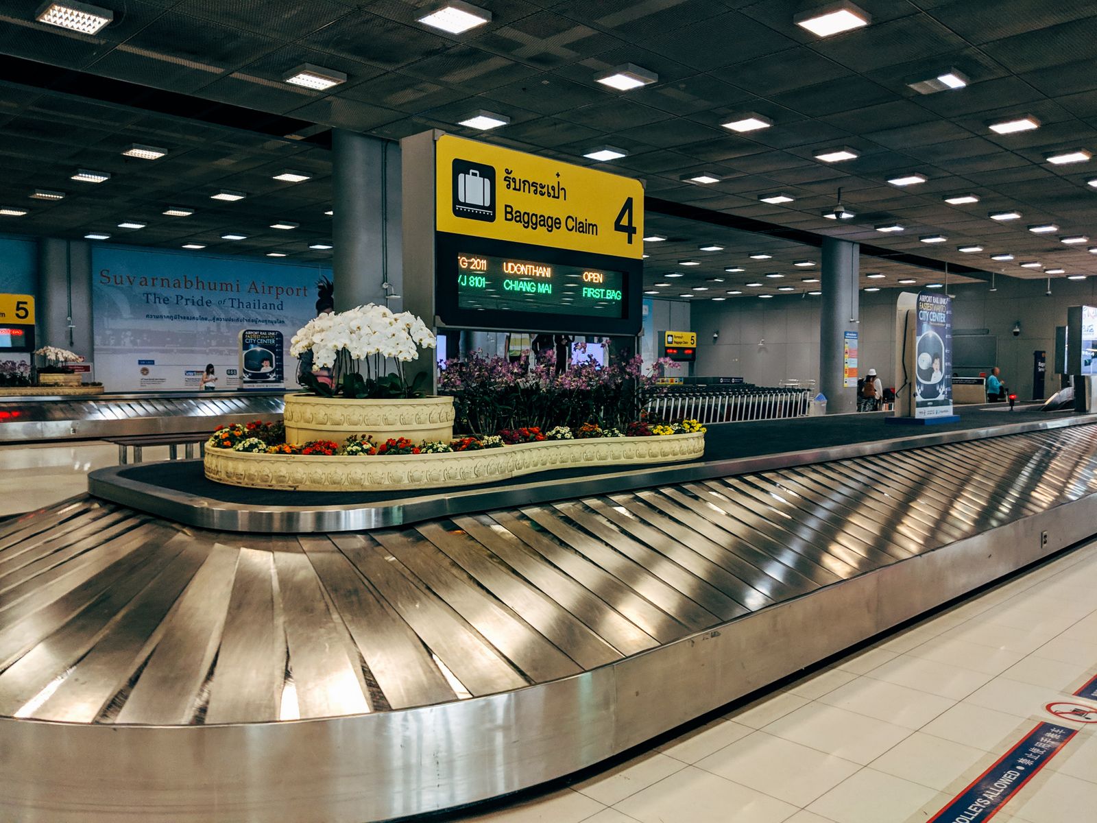 Suitcases on an airport baggage carousel